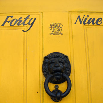 "forty nine" on yellow door